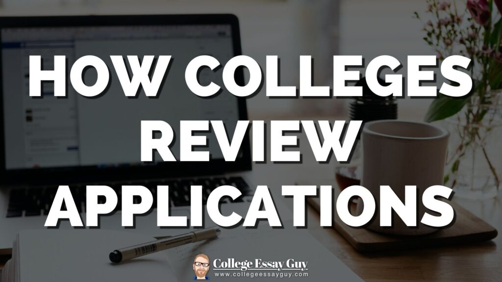 A laptop, notebook, pen, and coffee cup on a desk, with bold text overlay: "How Colleges Review Applications.