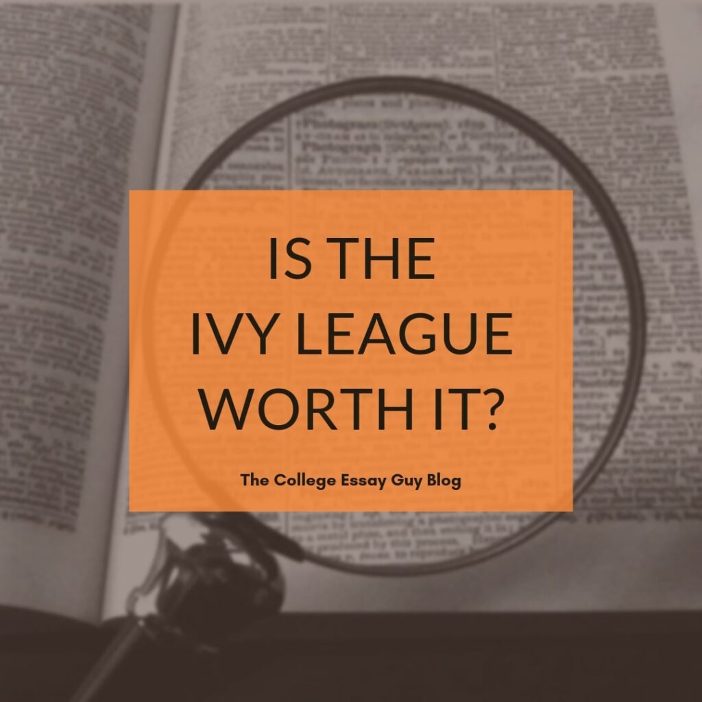 A magnifying glass is placed over an open book, with an orange overlay displaying the text "Is the Ivy League Worth It? The College Essay Guy Blog.