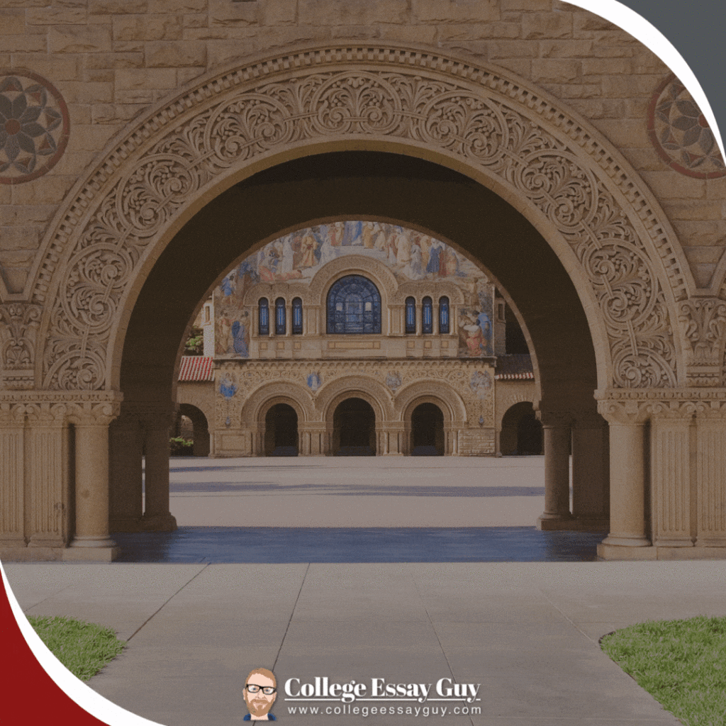 Stone archways with ornate carvings frame a view of Stanford University's Memorial Church, with mosaic artwork visible on the church facade.